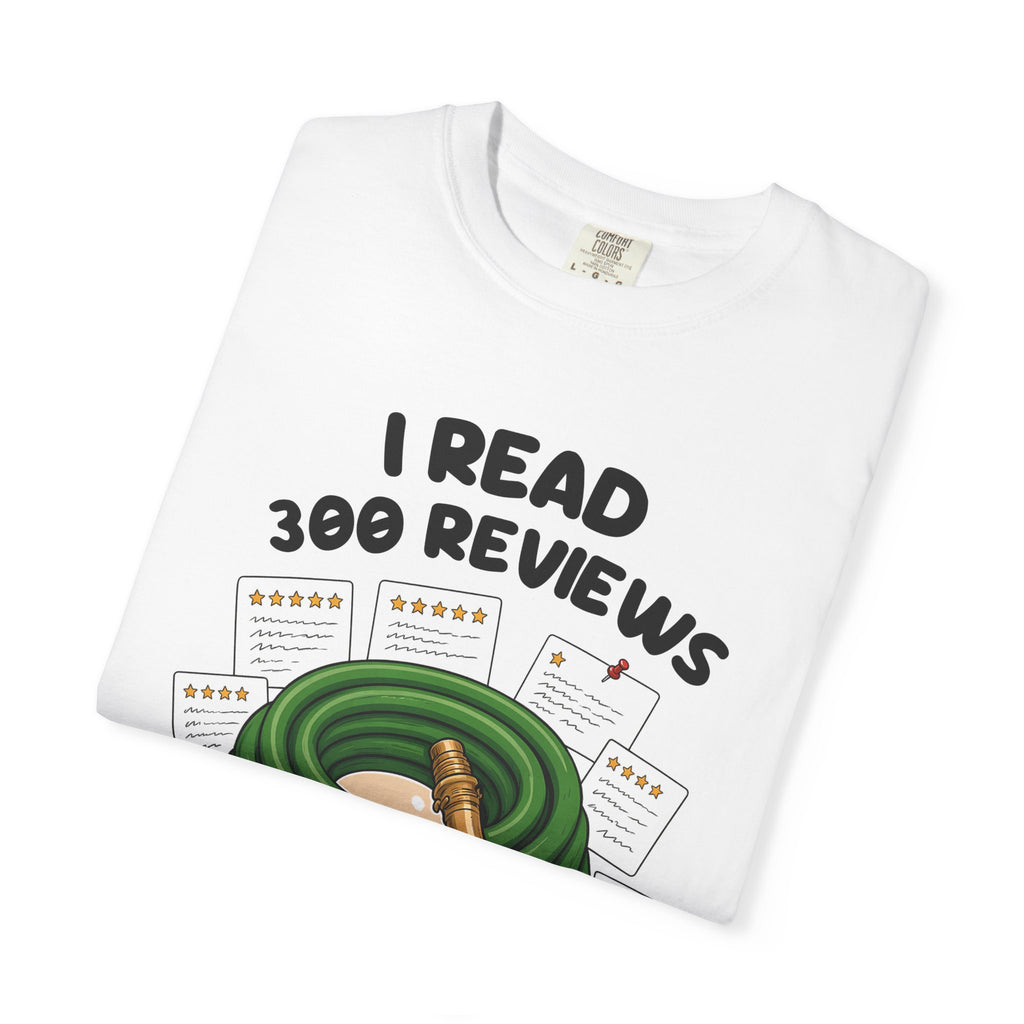 Folded white I Read 300 Reviews for a Garden Hose tee by Mildly Unavailable, close-up of the front design