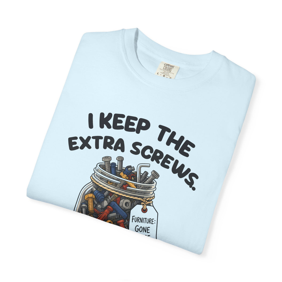 Folded chambray I Keep the Extra Screws tee by Mildly Unavailable, close-up of the front design