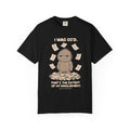 Black tee with the I Was CC'd design: Murray, a grumpy furry little guy, sitting in a pile of paper with the line That's the extent of my involvement, by Mildly Unavailable