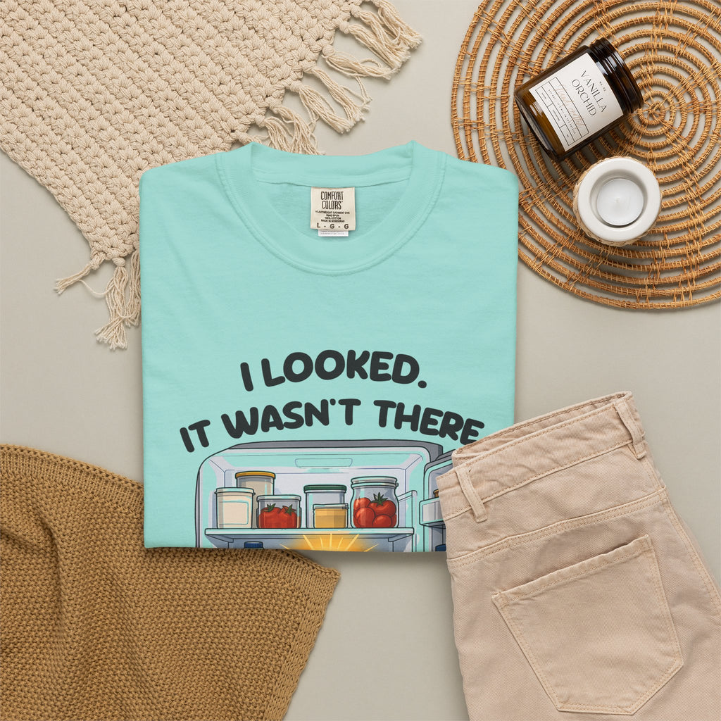 Chalky Mint I Looked. It Wasn't There. It Was There. tee by Mildly Unavailable laid flat with folded pants and home decor
