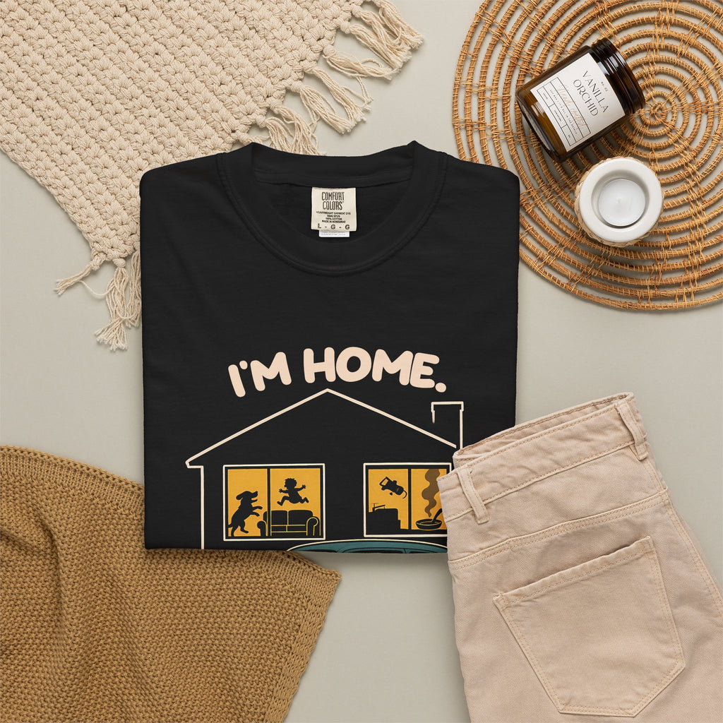 Black Just Sitting in the Car for a Minute Murray tee by Mildly Unavailable laid flat with folded pants and home decor