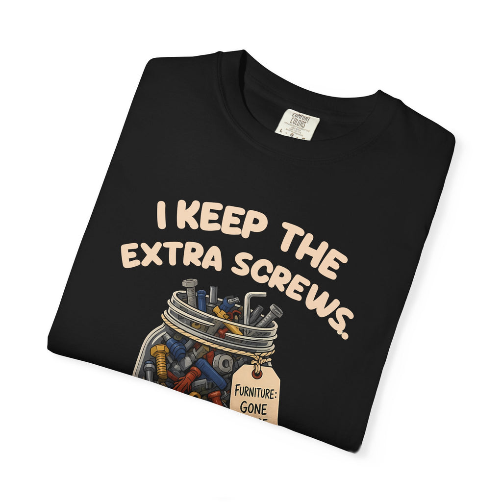 Folded black I Keep the Extra Screws tee by Mildly Unavailable, close-up of the front design