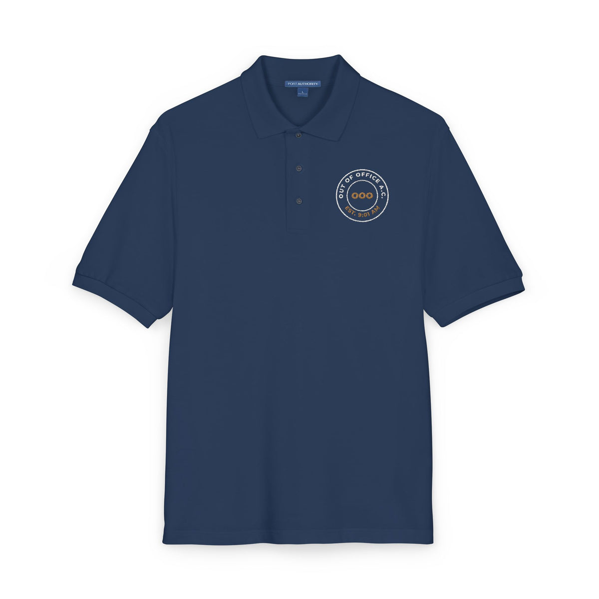 Close-up of the embroidered chest on the navy Out of Office Athletic Club polo by Mildly Unavailable