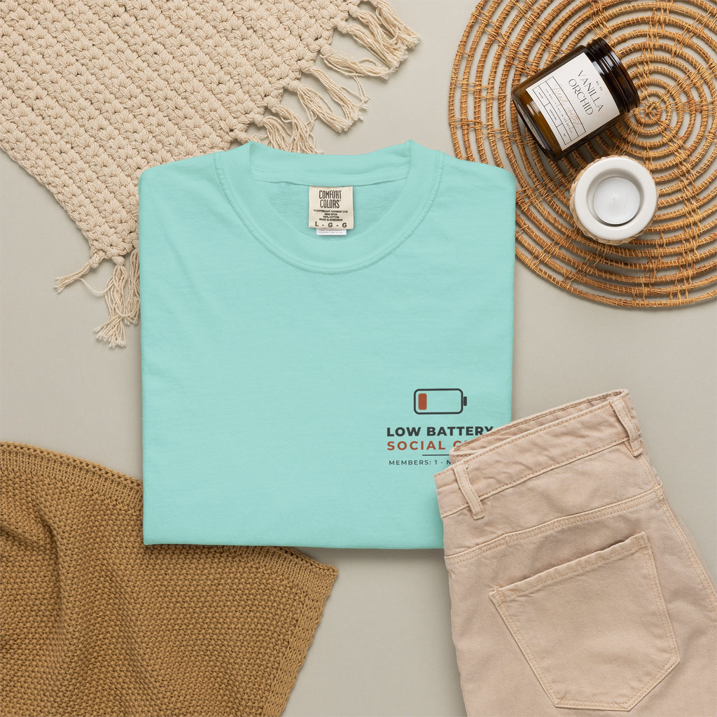 Flat-lay of the chalky mint Low Battery Social Club tee by Mildly Unavailable