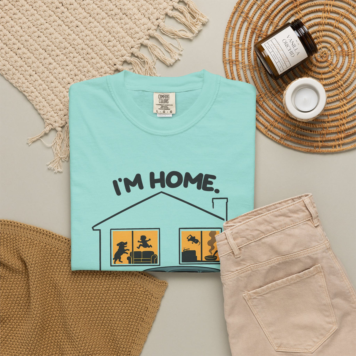 Chalky Mint Just Sitting in the Car for a Minute Murray tee by Mildly Unavailable laid flat with folded pants and home decor