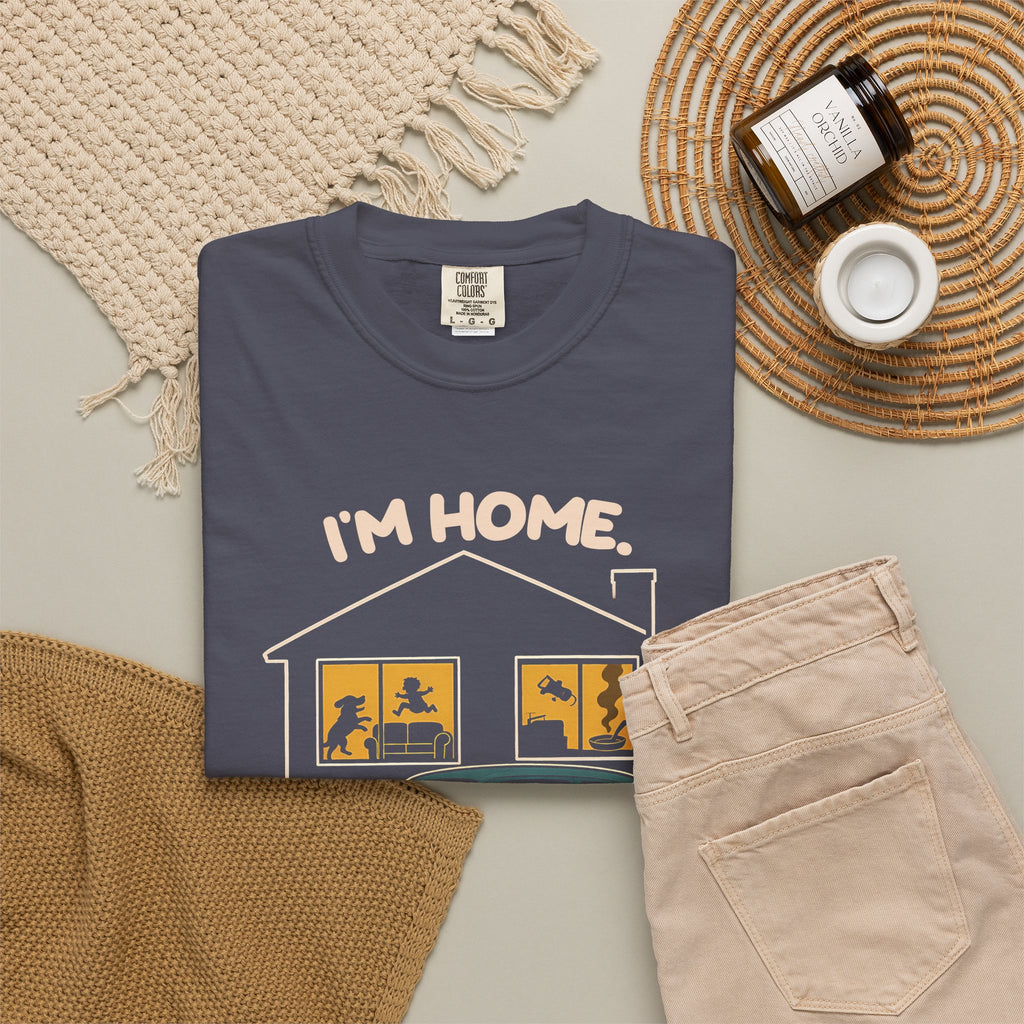 Navy Just Sitting in the Car for a Minute Murray tee by Mildly Unavailable laid flat with folded pants and home decor