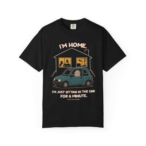 Black tee with the I'm Home design: Murray sitting in a car in the driveway outside a busy house, with the line I'm just sitting in the car for a minute, by Mildly Unavailable