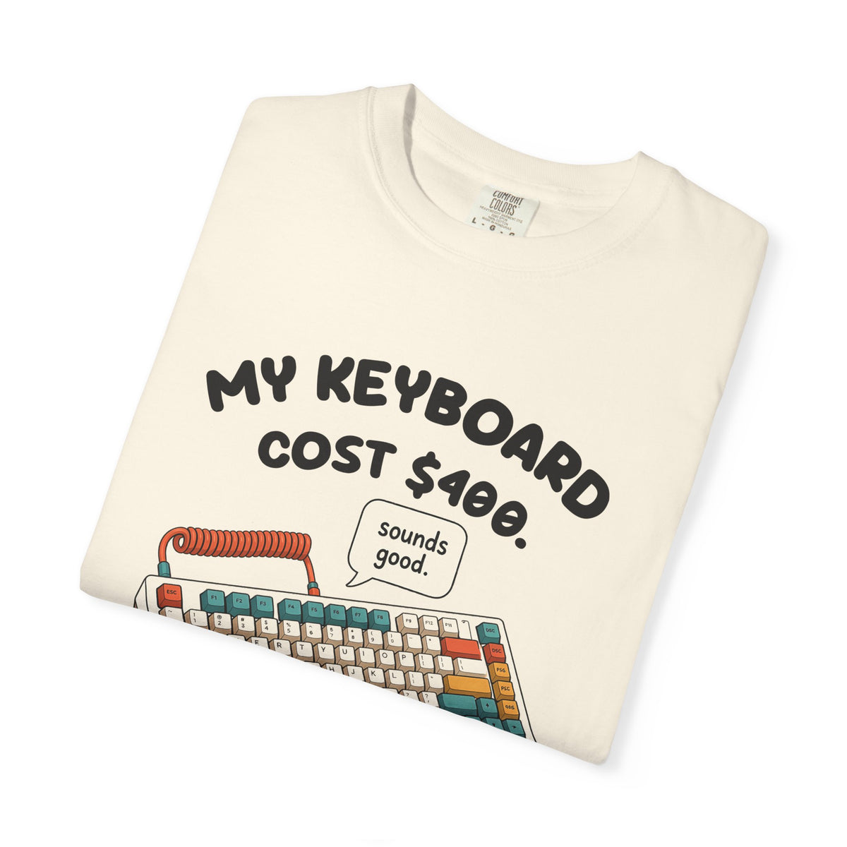 Folded ivory My Keyboard Cost $400 tee by Mildly Unavailable, close-up of the front design