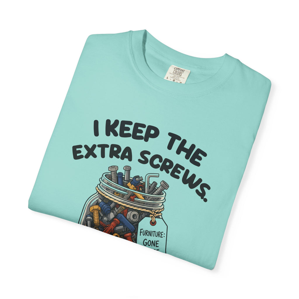 Folded chalky mint I Keep the Extra Screws tee by Mildly Unavailable, close-up of the front design