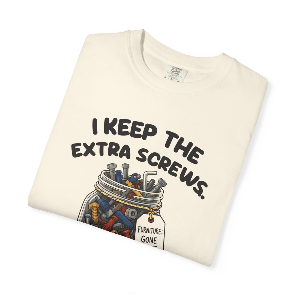 Folded ivory I Keep the Extra Screws tee by Mildly Unavailable, close-up of the front design