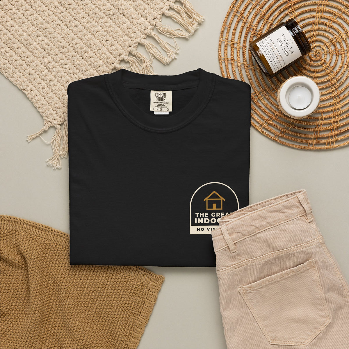Flat-lay of the black The Great Indoors tee by Mildly Unavailable