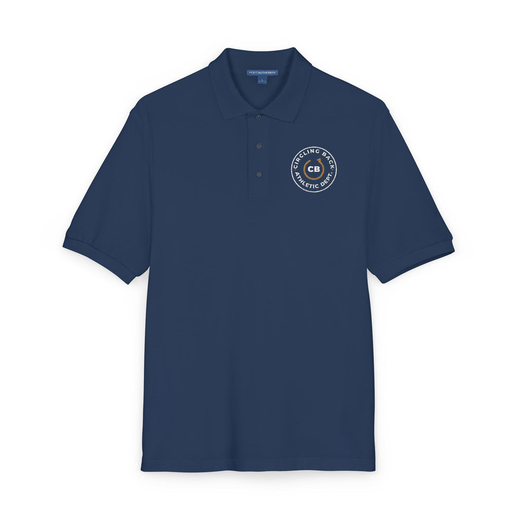 Close-up of the embroidered chest on the navy Circling Back Athletic Dept. polo by Mildly Unavailable