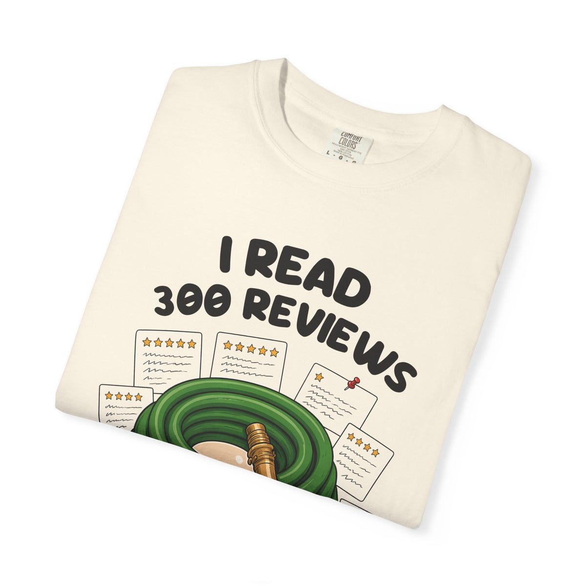 Folded ivory I Read 300 Reviews for a Garden Hose tee by Mildly Unavailable, close-up of the front design