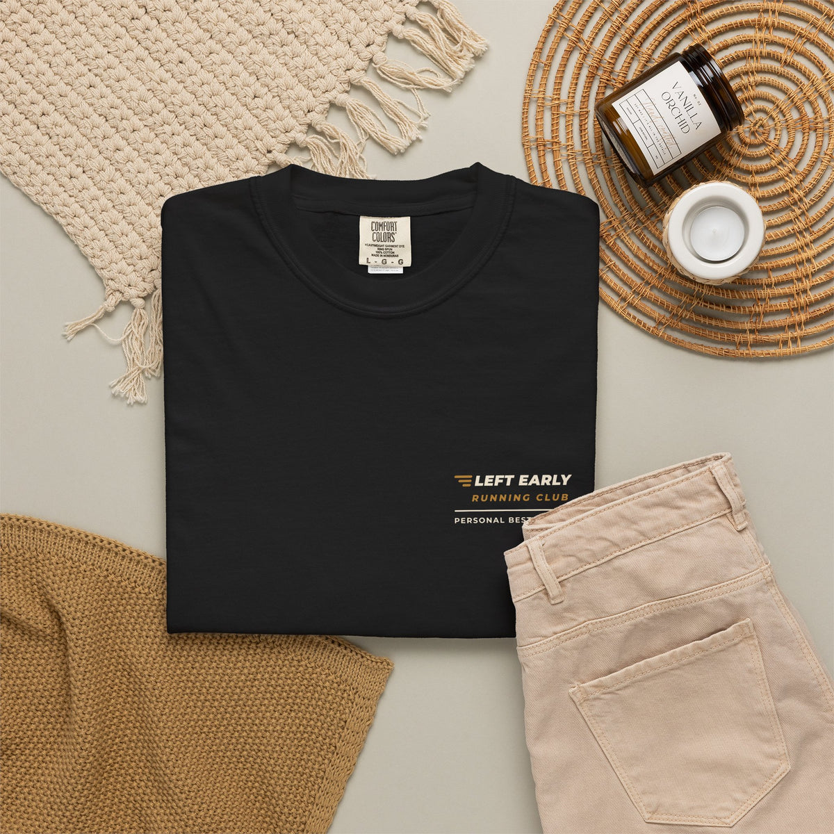 Flat-lay of the black Left Early Running Club tee by Mildly Unavailable
