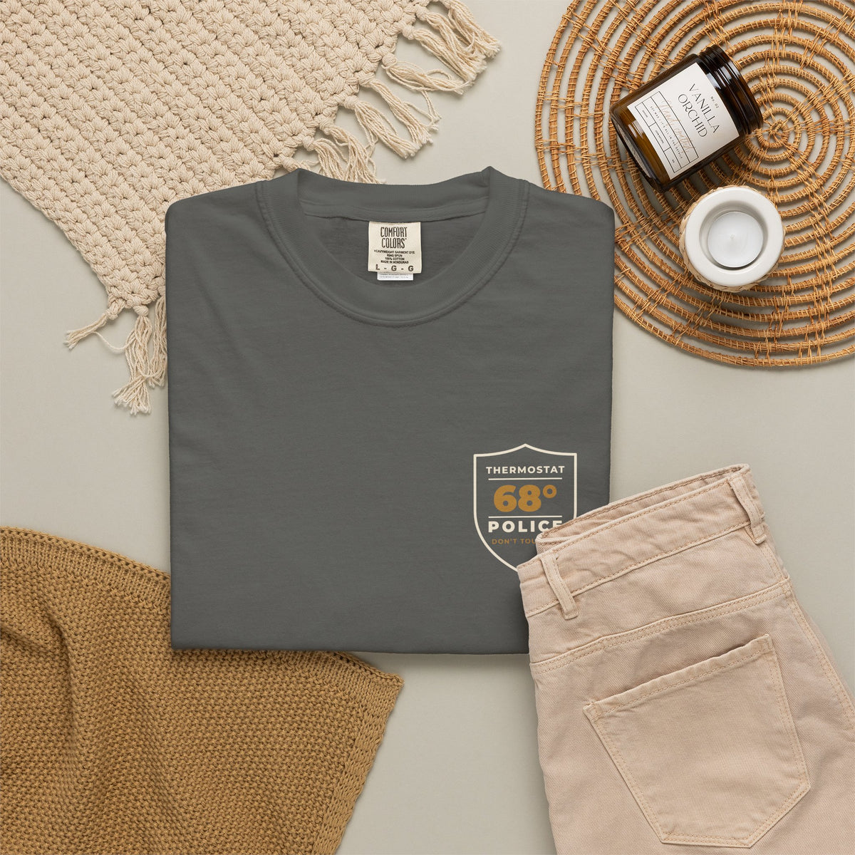 Flat-lay of the pepper Thermostat Police tee by Mildly Unavailable