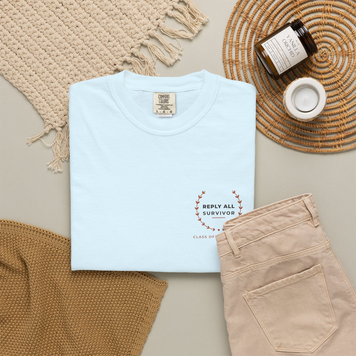 Flat-lay of the chambray Reply All Survivor tee by Mildly Unavailable