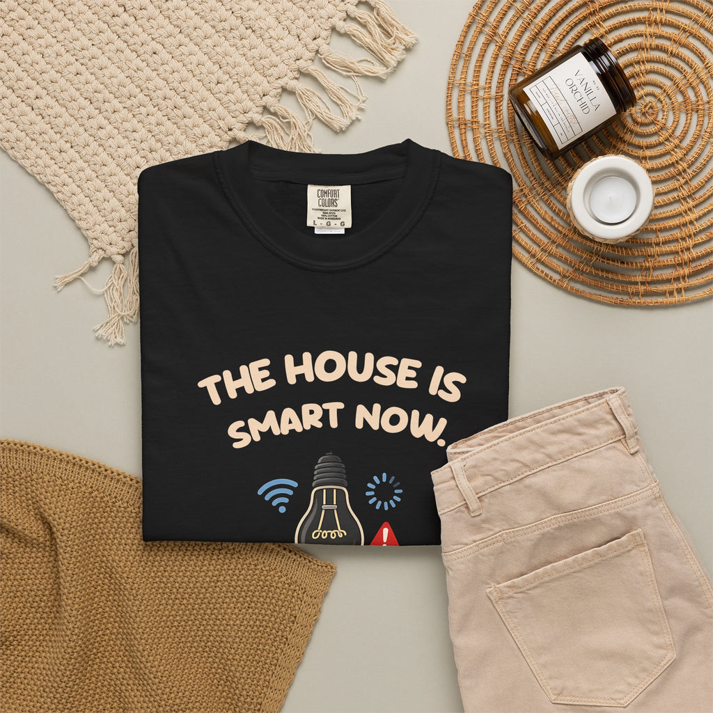 Black The House Is Smart Now tee by Mildly Unavailable laid flat with folded pants and home decor