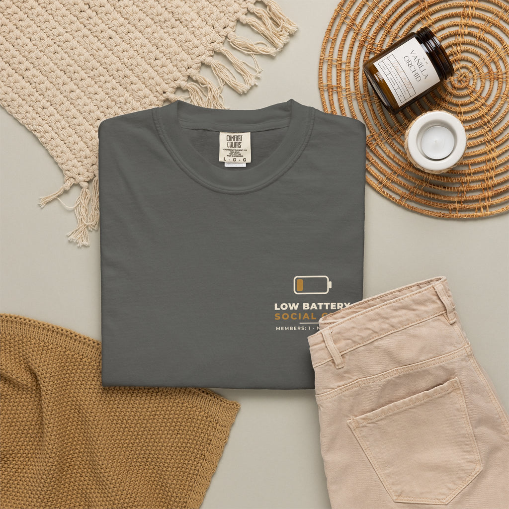 Flat-lay of the pepper Low Battery Social Club tee by Mildly Unavailable