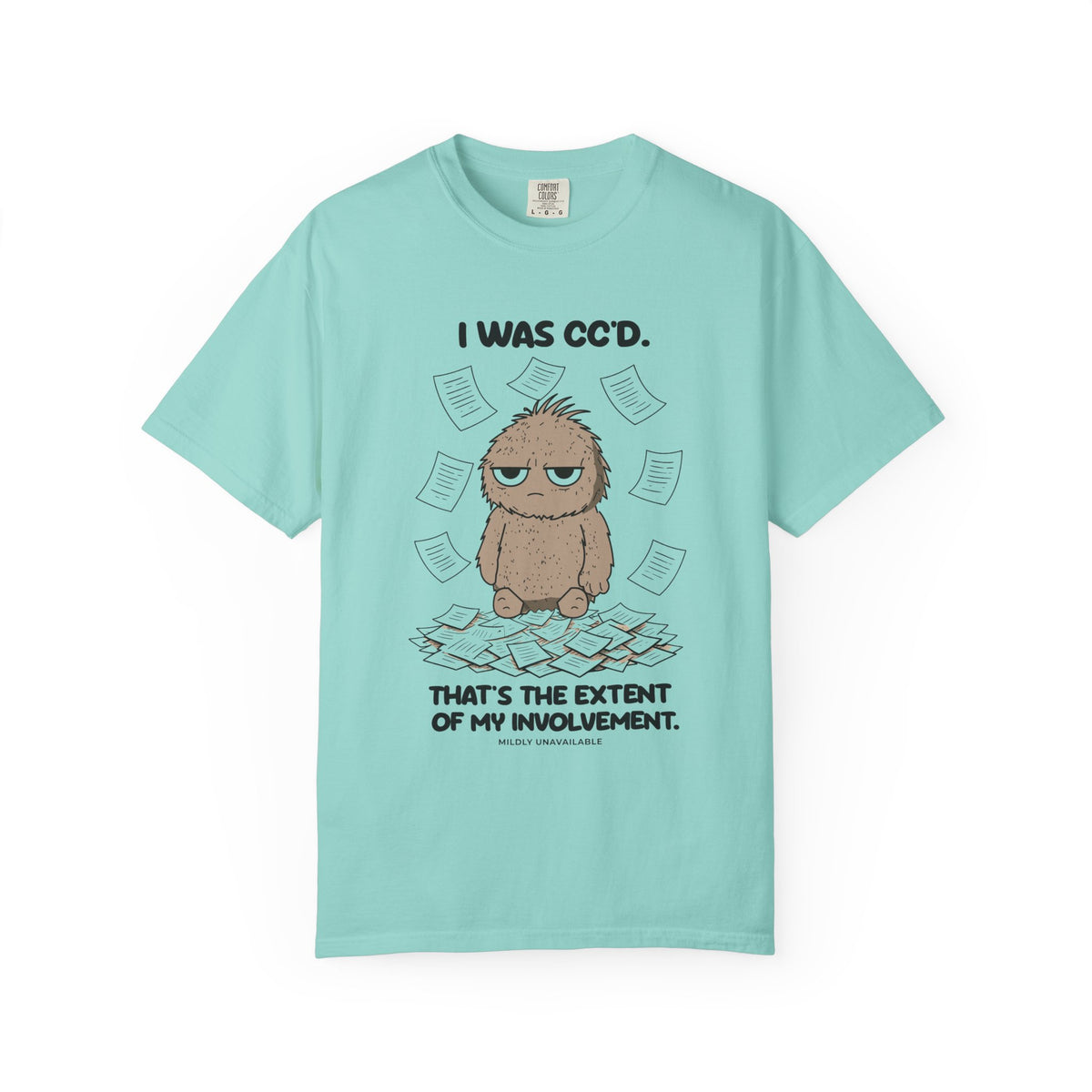 Chalky Mint tee with the I Was CC'd design: Murray, a grumpy furry little guy, sitting in a pile of paper with the line That's the extent of my involvement, by Mildly Unavailable