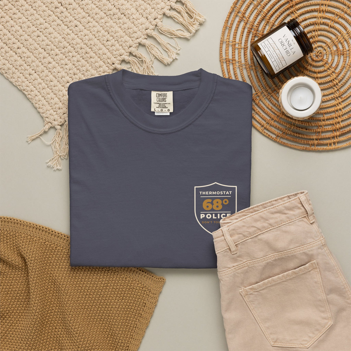 Flat-lay of the navy Thermostat Police tee by Mildly Unavailable