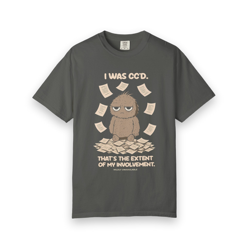 Pepper tee with the I Was CC'd design: Murray, a grumpy furry little guy, sitting in a pile of paper with the line That's the extent of my involvement, by Mildly Unavailable