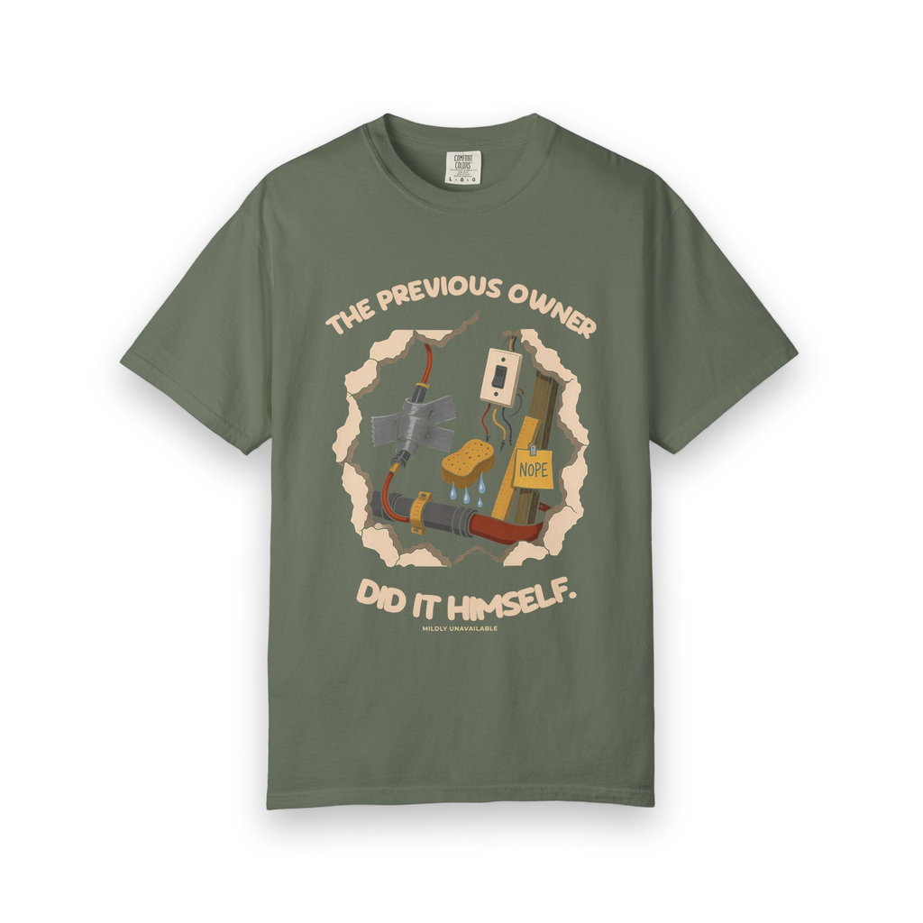 Moss tee with the The Previous Owner Did It Himself design: a hole in the wall showing duct-taped pipes, a sponge and a sign that says Nope, by Mildly Unavailable